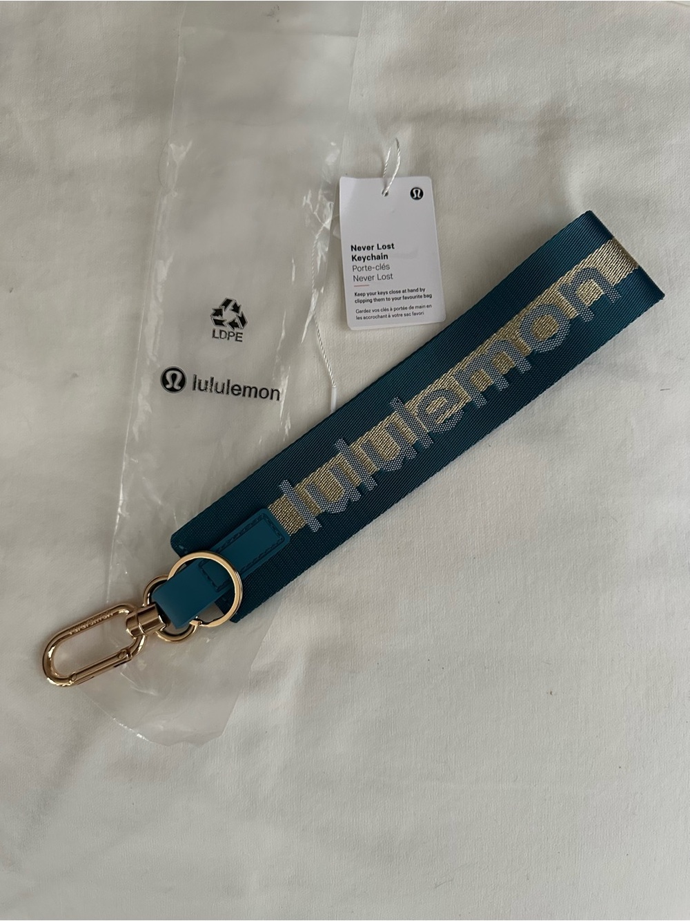 lululemon athletica Never Lost Keychain Teal with gold and with Gold Hardware